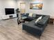Cozy living room featuring stylish furnishings and ample natural light at 4441 Groveland Ave, Sarasota, FL 34231