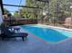 A private backyard pool with ample space for entertaining at 4441 Groveland Ave, Sarasota, FL 34231