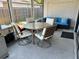 Relaxing screened patio perfect for outdoor dining and lounging at 4441 Groveland Ave, Sarasota, FL 34231