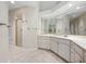 Bright bathroom featuring a walk-in shower and large vanity at 4472 Calle Serena, Sarasota, FL 34238