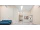Spacious living room with high ceilings, natural light, and an open layout at 4472 Calle Serena, Sarasota, FL 34238