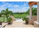 Exterior view showcasing the meticulously maintained community landscaping at 4472 Calle Serena, Sarasota, FL 34238