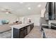 Spacious kitchen featuring a granite island, modern appliances, and an open layout at 4610 Clarke St, North Port, FL 34286