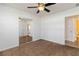 Bright bedroom features neutral carpet, ceiling fan, and sliding closet doors at 5200 Malaga Ave, Sarasota, FL 34235