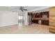 Modern kitchen with stainless steel appliances and dark wood cabinetry at 5200 Malaga Ave, Sarasota, FL 34235