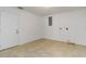 Laundry area features tile flooring, utility connections and exterior door at 5200 Malaga Ave, Sarasota, FL 34235