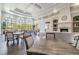Grand clubhouse features stylish seating, a fireplace, and large windows with peaceful views at 5368 Eliseo St, Sarasota, FL 34238
