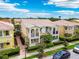 Beautiful two-story home with double balconies and well-manicured landscaping at 5368 Eliseo St, Sarasota, FL 34238