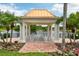 Picturesque gazebo overlooking a tranquil lake surrounded by tropical foliage at 5368 Eliseo St, Sarasota, FL 34238