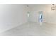 Open and airy living room with recessed lighting and large format tile at 5508 83Rd E Ter, Sarasota, FL 34243