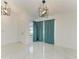Living room with a view of the landscaped front yard at 5508 83Rd E Ter, Sarasota, FL 34243