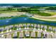 Beautiful aerial view of homes surrounding a lake in a residential community at 5644 Flagstone Trl, Palmetto, FL 34221