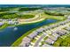 Gorgeous aerial view showcasing the community's layout and water features at 5644 Flagstone Trl, Palmetto, FL 34221