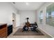 Flex room featuring an exercise bike, natural light, and neutral décor at 5644 Flagstone Trl, Palmetto, FL 34221