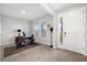 Versatile room with tile flooring, exercise equipment, and a sunlit window at 5644 Flagstone Trl, Palmetto, FL 34221