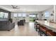 Open living area features large windows, neutral walls and granite countertop at 5644 Flagstone Trl, Palmetto, FL 34221