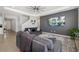 Comfortable living room featuring tray ceilings, neutral walls and an accent rug at 5644 Flagstone Trl, Palmetto, FL 34221