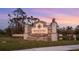 Silverstone community sign with stone and brick textures at dusk at 5644 Flagstone Trl, Palmetto, FL 34221