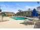 This community pool offers plenty of seating and shaded tables, perfect for relaxation and enjoying the water at 6310 Green Oak Cir, Bradenton, FL 34203