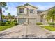 Charming two-story home with a well-maintained lawn and a two-car garage at 6310 Green Oak Cir, Bradenton, FL 34203