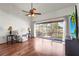Bright living room with hardwood floors, high ceilings and a screened lanai at 6310 Green Oak Cir, Bradenton, FL 34203