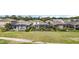 Aerial view displays backyards with screened-in pools, well-maintained landscaping, and fencing at 6377 Mighty Eagle Way, Sarasota, FL 34241