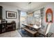 Cozy dining area with stylish furnishings and lots of natural light from dual large windows at 6377 Mighty Eagle Way, Sarasota, FL 34241