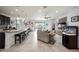 Bright and airy open-concept living space with a large island and stylish furnishings at 6377 Mighty Eagle Way, Sarasota, FL 34241