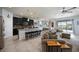 Bright and airy open-concept living space with a large island and stylish furnishings at 6377 Mighty Eagle Way, Sarasota, FL 34241