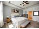 Cozy main bedroom with a tray ceiling, soft lighting, and elegant decor at 6377 Mighty Eagle Way, Sarasota, FL 34241