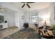 Bright home office with a dedicated workspace, natural light, and modern décor at 6377 Mighty Eagle Way, Sarasota, FL 34241