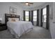Bedroom with a bay window and a view of the neighborhood for added charm at 6714 Alstead Cir, Bradenton, FL 34202