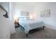Charming bedroom featuring a metal bed frame, soft carpet, and nautical-themed decorations for a serene vibe at 6714 Alstead Cir, Bradenton, FL 34202