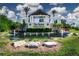 Community entrance features a water fountain, landscaping and manicured garden at 6714 Alstead Cir, Bradenton, FL 34202