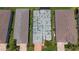 Overhead schematic of the home showcasing a two-car garage, multiple bedrooms, and open concept gathering space at 6714 Alstead Cir, Bradenton, FL 34202
