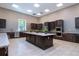 Clubhouse kitchen with stainless steel appliances and an island at 6714 Alstead Cir, Bradenton, FL 34202