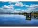 Lake view with a dock and gazebo at 6714 Alstead Cir, Bradenton, FL 34202