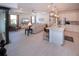 Spacious living area featuring an open floorplan with the kitchen, dining area, and living room at 6714 Alstead Cir, Bradenton, FL 34202