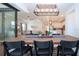 Open-concept living space with dining area, kitchen, living room, and recessed lighting throughout at 6714 Alstead Cir, Bradenton, FL 34202