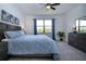 This main bedroom offers soft carpet, great light, and tastefully decorated decor throughout at 6714 Alstead Cir, Bradenton, FL 34202