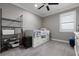 Clean bedroom with a ceiling fan, gray walls, and neutral carpet at 7020 Island Queen Ct, Sarasota, FL 34233