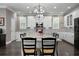 Bright kitchen with modern appliances and granite countertops, and open concept at 7020 Island Queen Ct, Sarasota, FL 34233