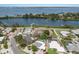 Gorgeous aerial view of waterfront homes nestled along the river at 715 Fontana Ln, Bradenton, FL 34209