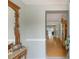 Classic entryway featuring hardwood floors and elegant decor, leading to the living spaces at 715 Fontana Ln, Bradenton, FL 34209