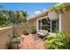 Outdoor patio featuring brick flooring, plants, and comfortable seating, perfect for relaxation at 715 Fontana Ln, Bradenton, FL 34209