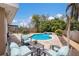 Inviting pool area with comfortable outdoor seating and a beautifully paved patio, great for entertaining at 715 Fontana Ln, Bradenton, FL 34209