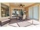 Outdoor patio featuring a table and chairs, ceiling fan, and TV at 730 Old Quarry Rd, Bradenton, FL 34212