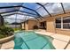 Beautiful screened-in pool and spa with an outdoor patio area at 730 Old Quarry Rd, Bradenton, FL 34212