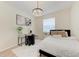 Charming bedroom with a modern light fixture and a view to the outside at 7327 38Th Court East, Sarasota, FL 34243