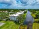Condo with golf course views, water access, green space, and mature trees at 7461 W Country Club N Dr # 203, Sarasota, FL 34243